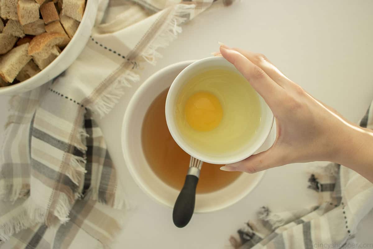 Egg being added to stock.