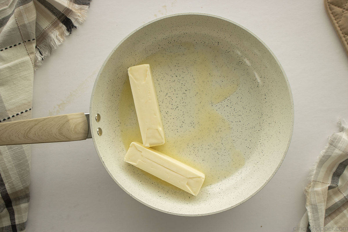 Melting butter in a pan.