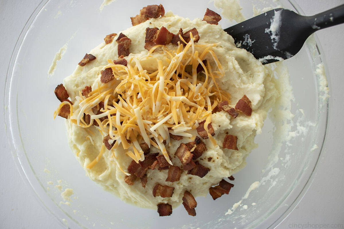 Bacon and cheese added to mashed potatoes.
