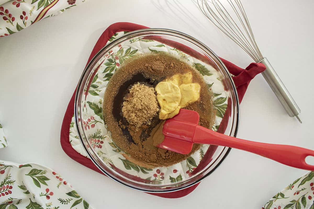 Maple glaze ingredients in a clear mixing bowl.