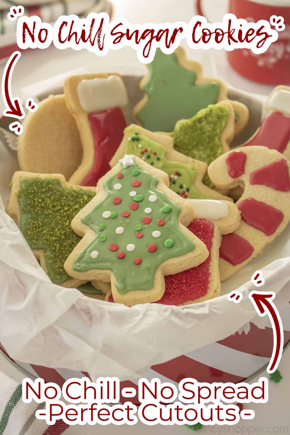 Christmas cookie tin filled with Sugar Cookies for gifting.