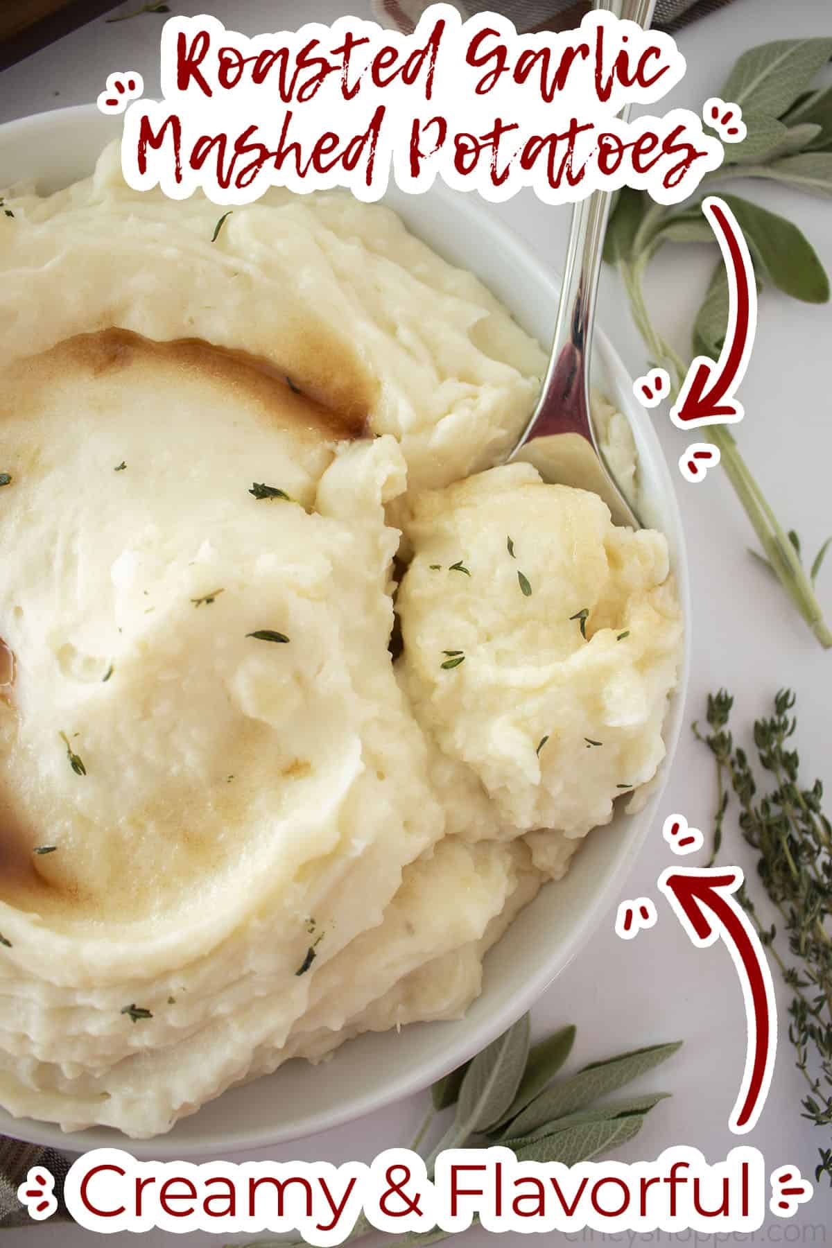 Bowl and spoon with Garlic Roasted mashed potatoes with text on image Creamy and Flavorful