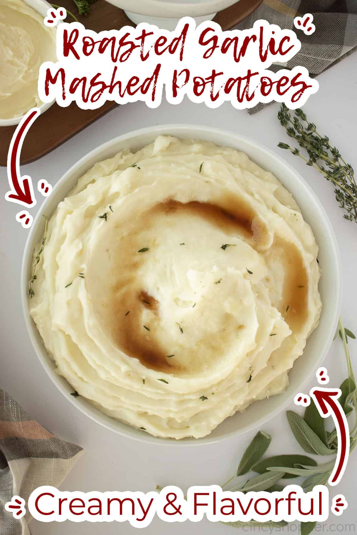 Bowl of mashed potatoes with roasted garlic with text on image Creamy and Flavorful