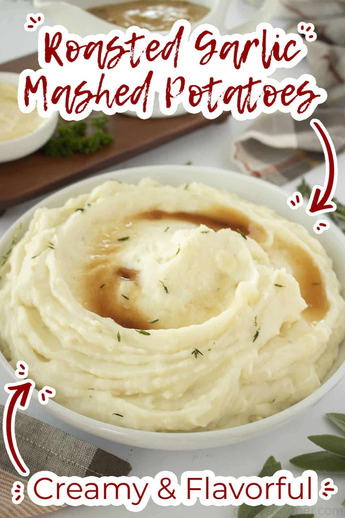 Bowl of brown butter topped garlic mashed potatoes with text on image Creamy and Flavorful
