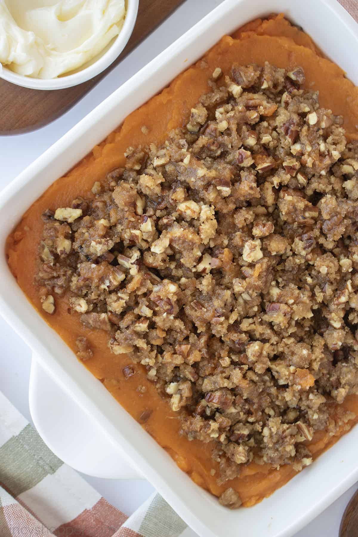 Overhead view of pecan topping on sweet potato casserole.