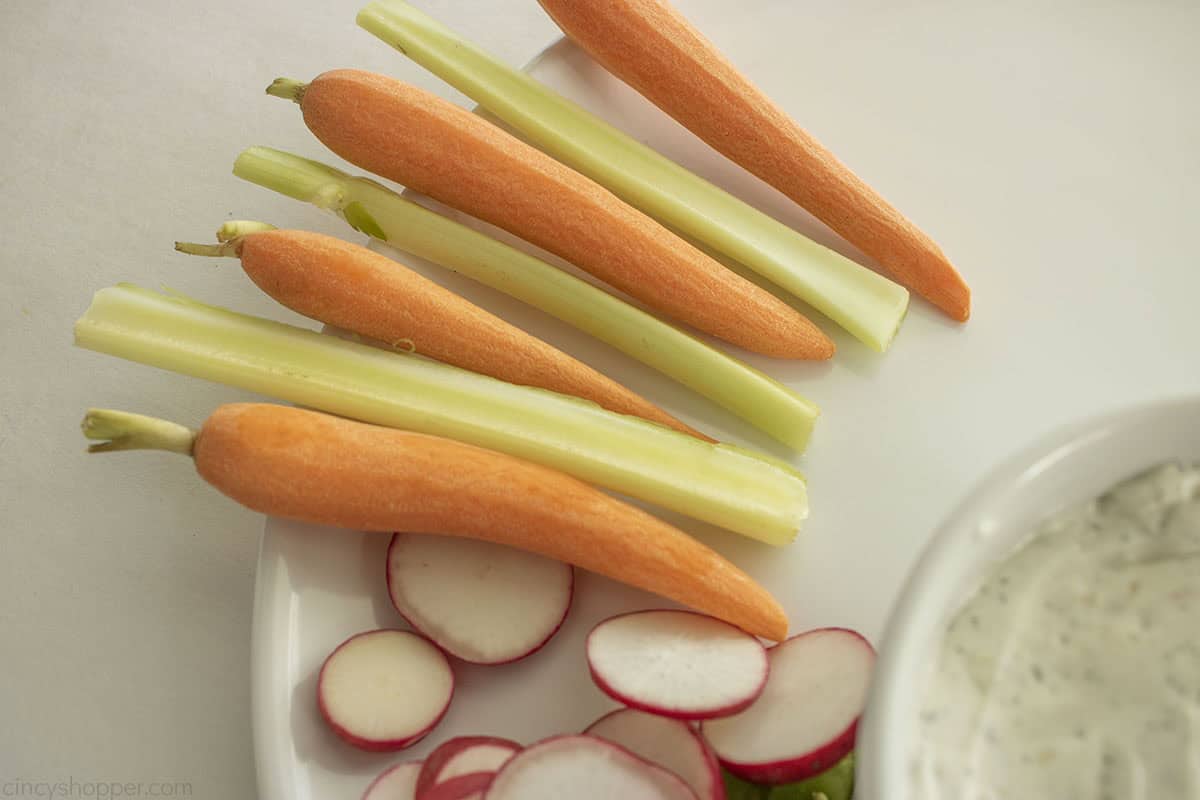 Peeled Baby Carrots and Celery Sticks on tray to create turkey feathers.