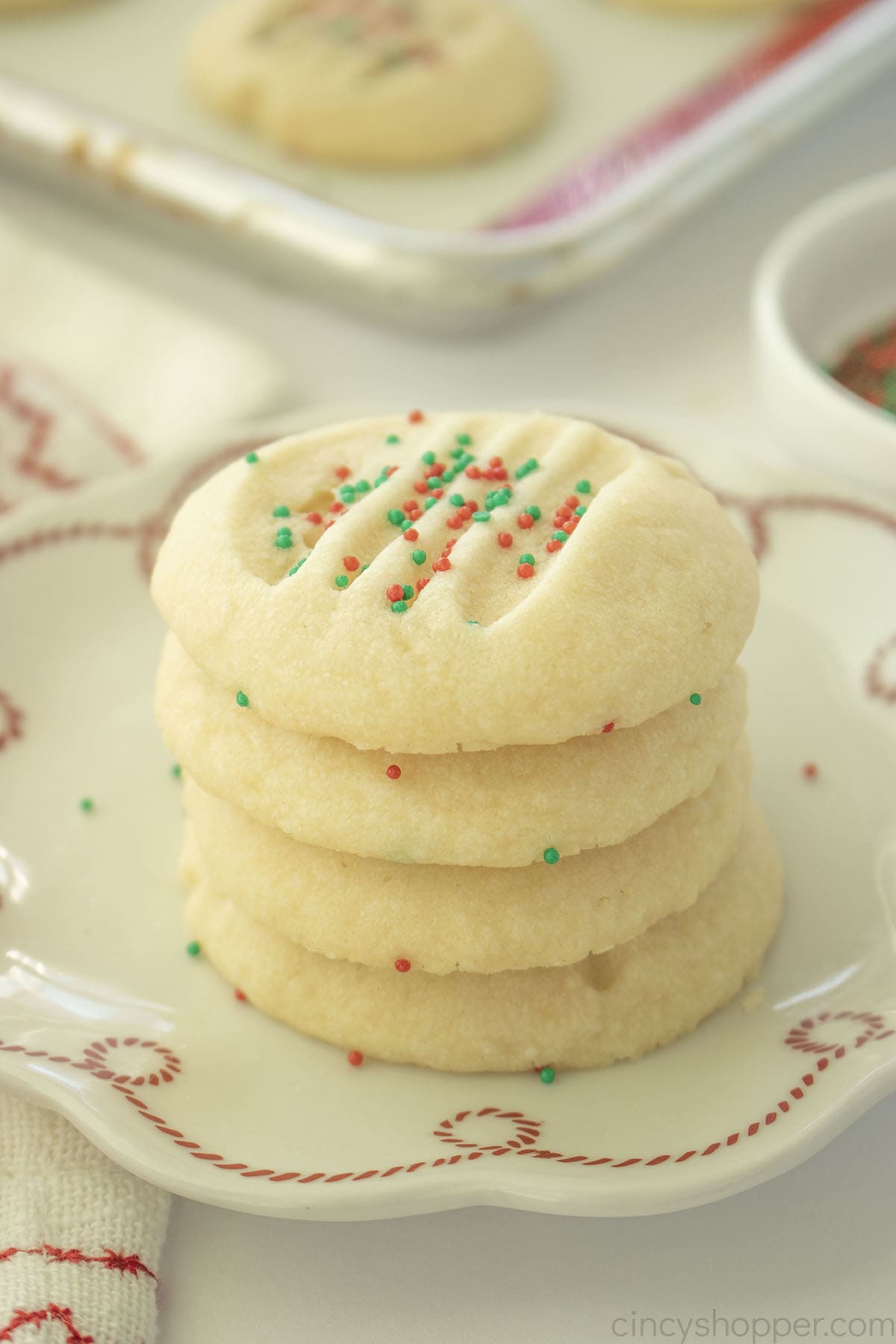 Stack of Whipped Shortbread Cookies on a plate.