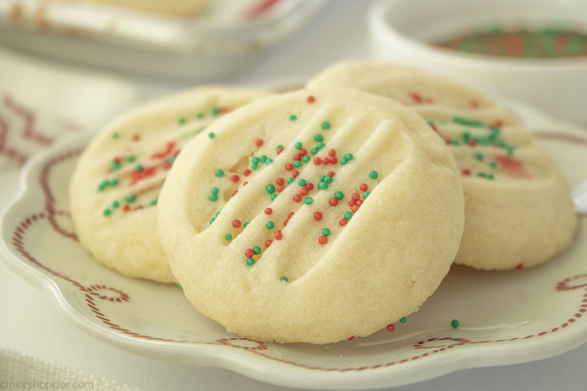 Side view of Whipped Shortbread Cookies with sprinkles.