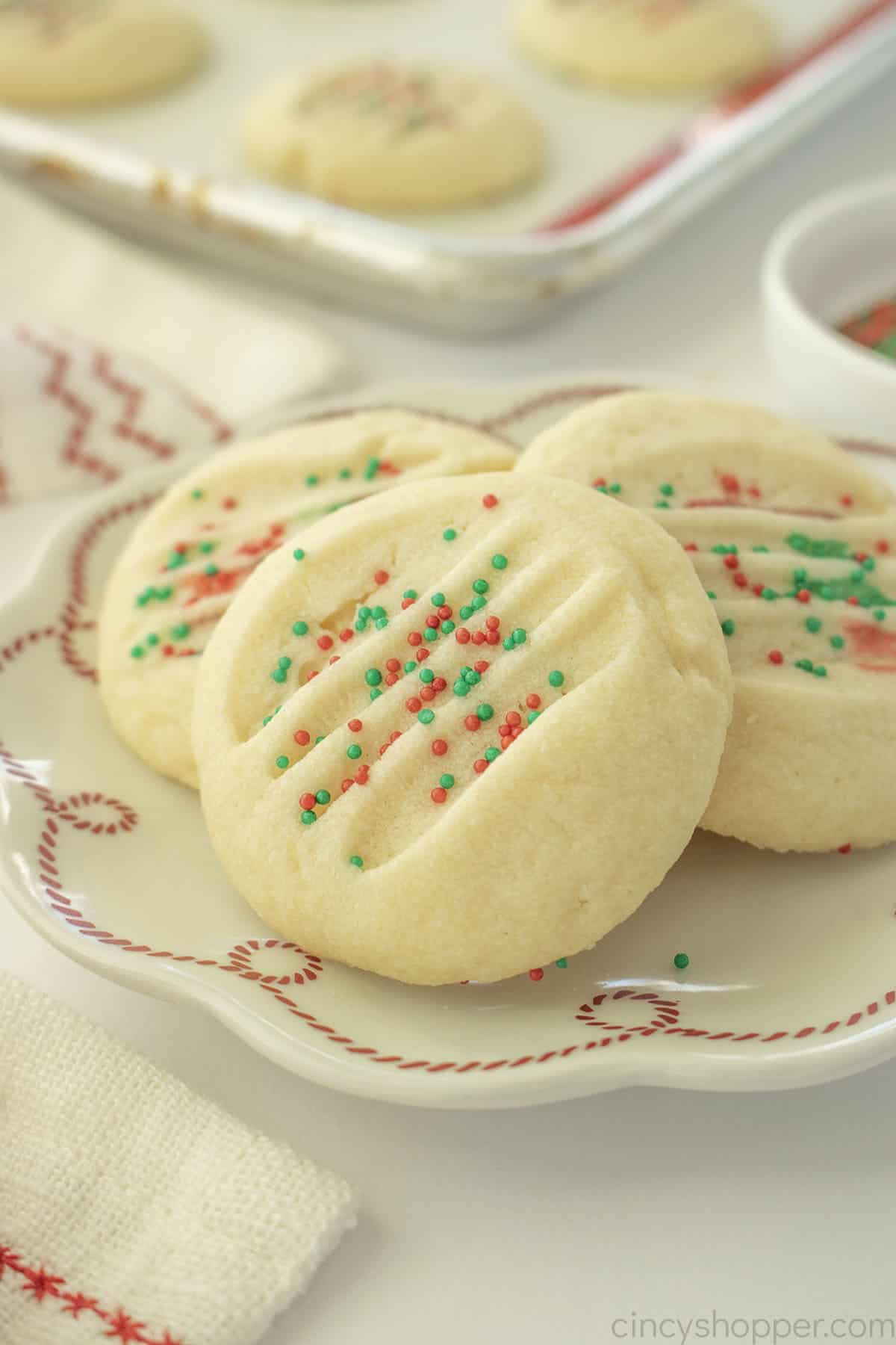 Closeup of shortbread cookie with sprinkles.