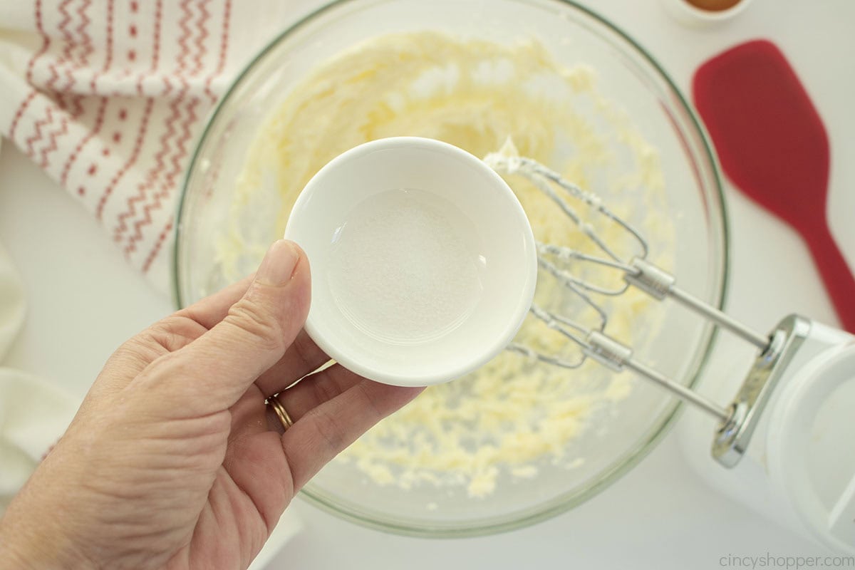 Salt added to butter and sugar mixture.