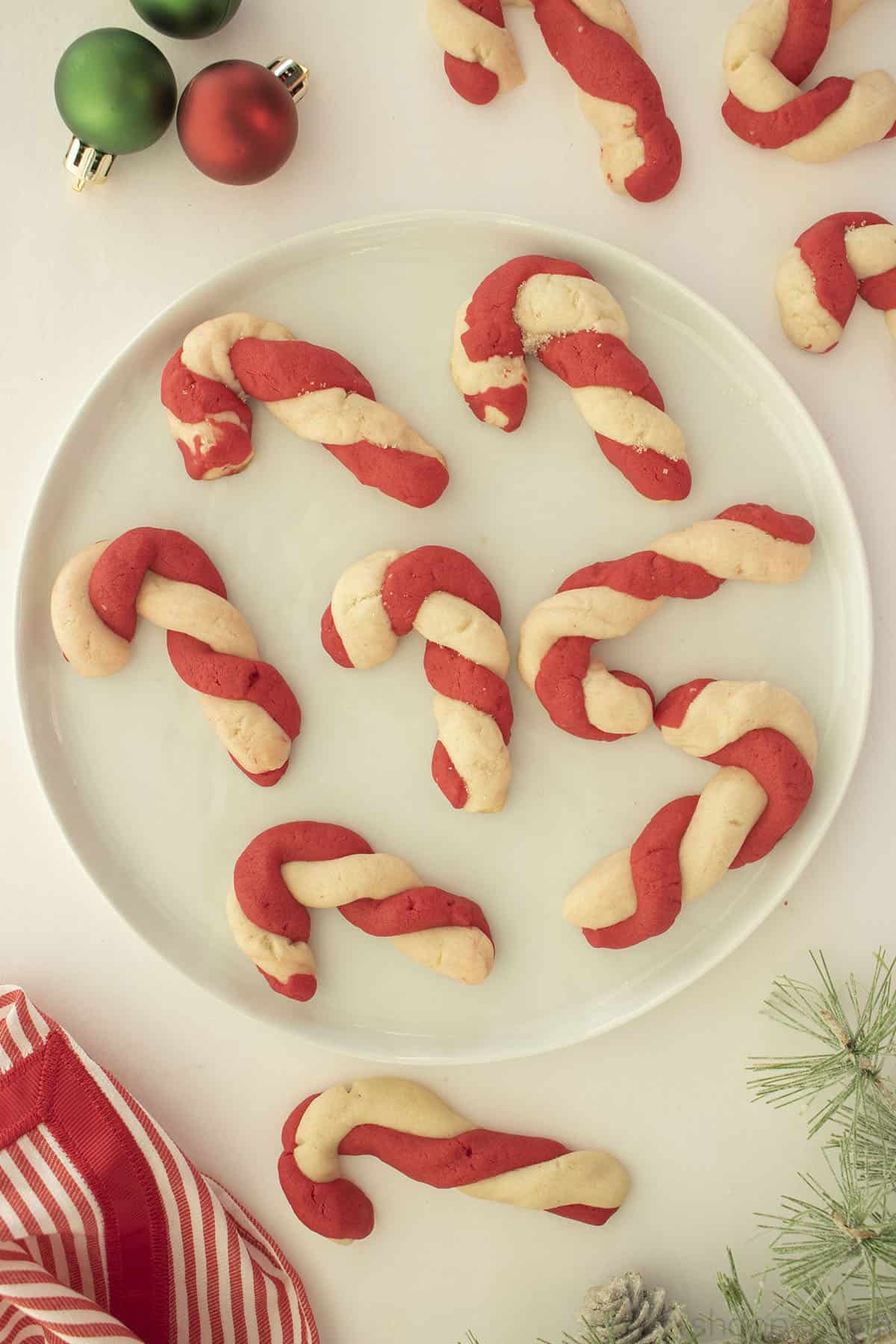Candy Cane Cookies on a white plate.