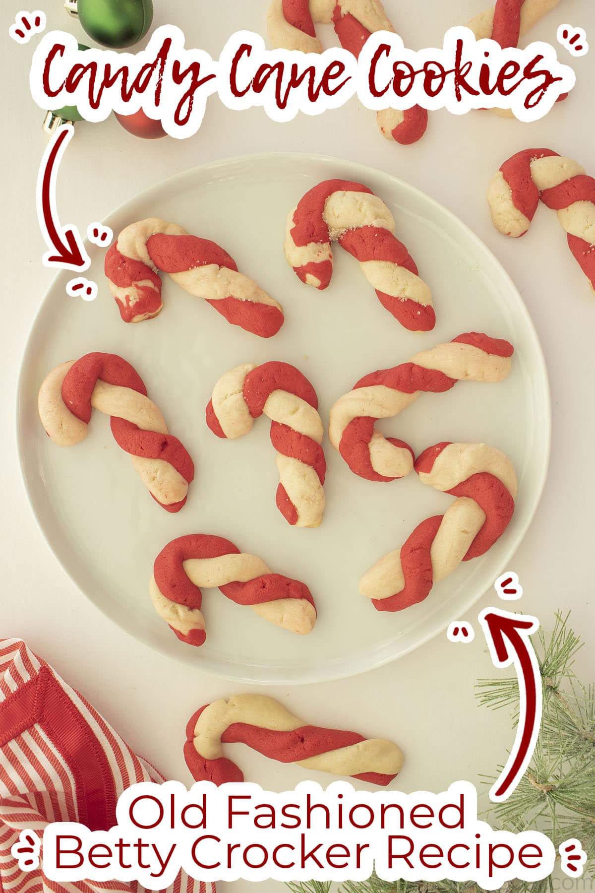 Braided candy cane cookies on a white platter text on image Old Fashioned Betty Crocker Recipe