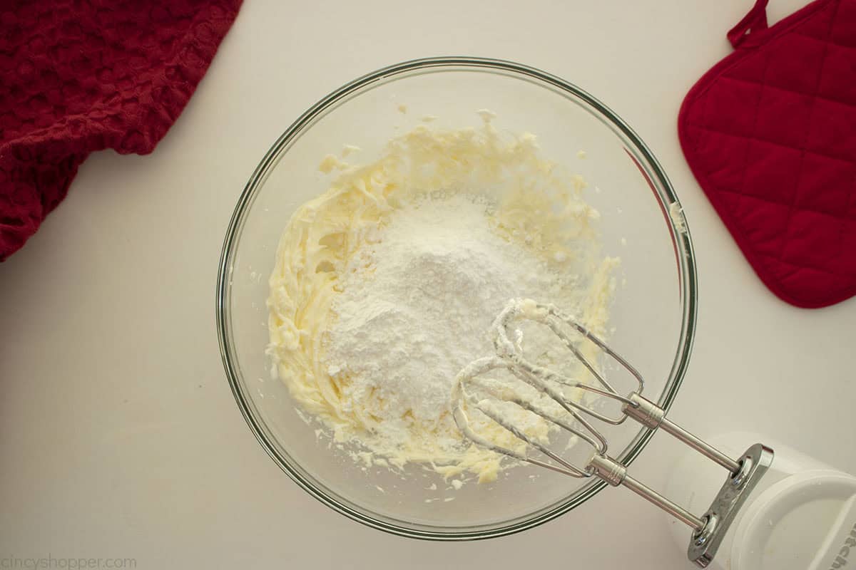Powdered sugar added to creamed butter.