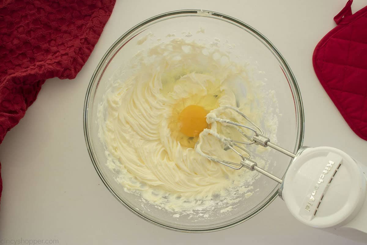 Egg added to cookie dough batter.