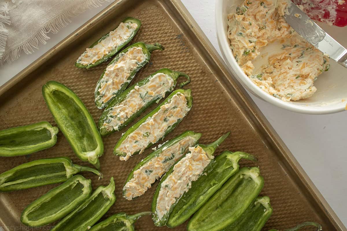 Jalapeno popper filling inside of peppers.