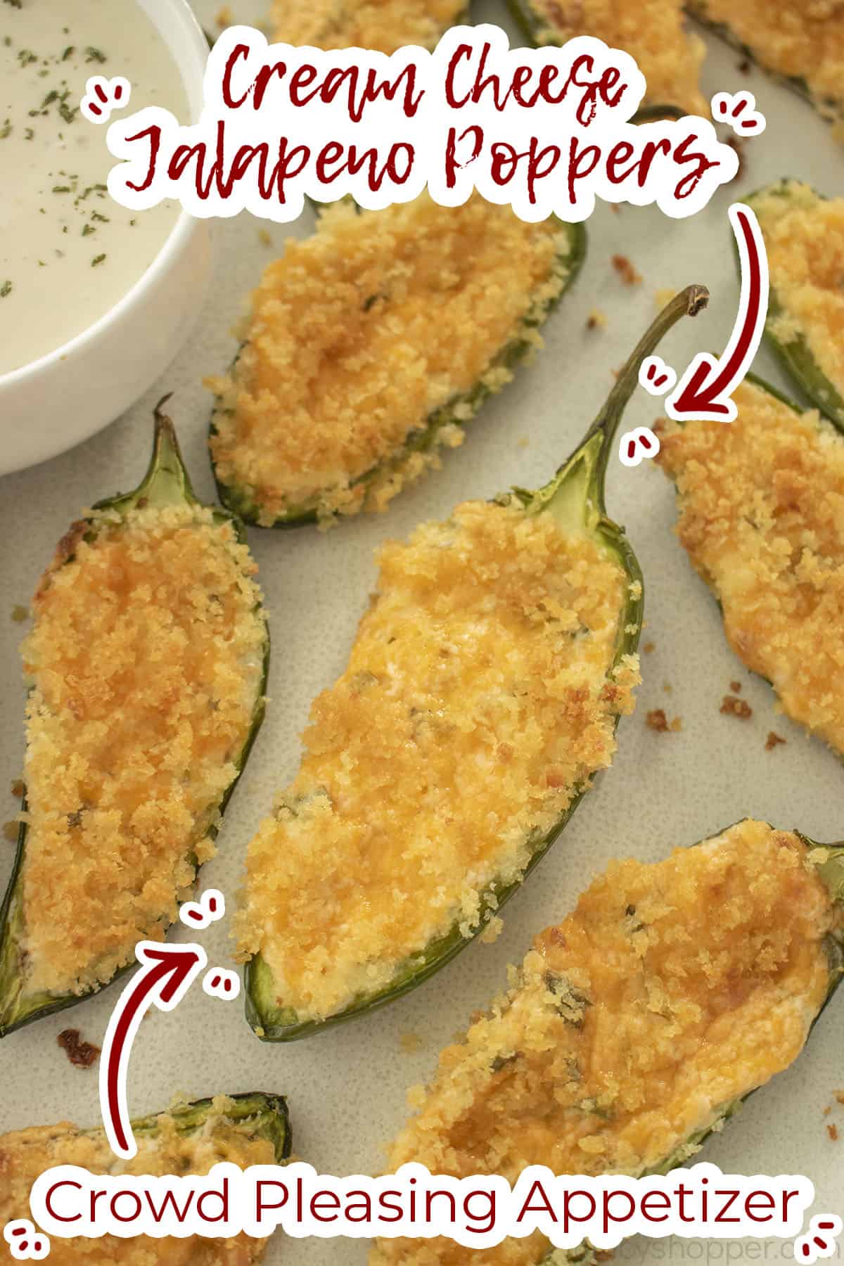 Jalapeno appetizers on a plate with Text on image crowd pleasing appetizer.
