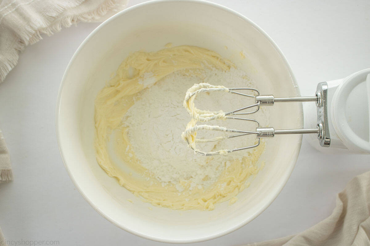 Creamed butter in mixing bowl.