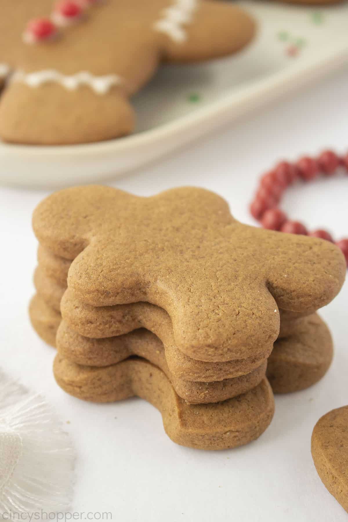 Stack of soft gingerbread man cookies.