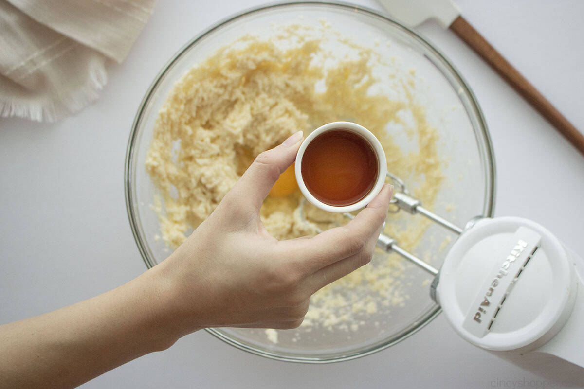 Egg and vanilla added to butter and sugar mixture.