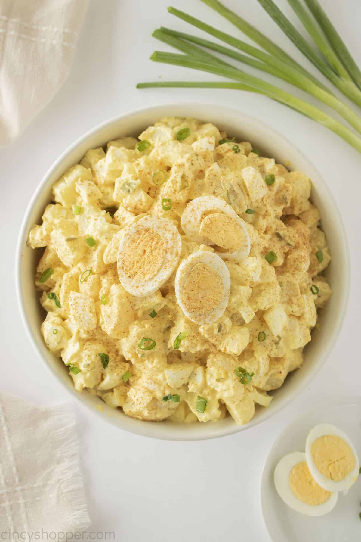 Deviled Egg Potato Salad in a white bowl.