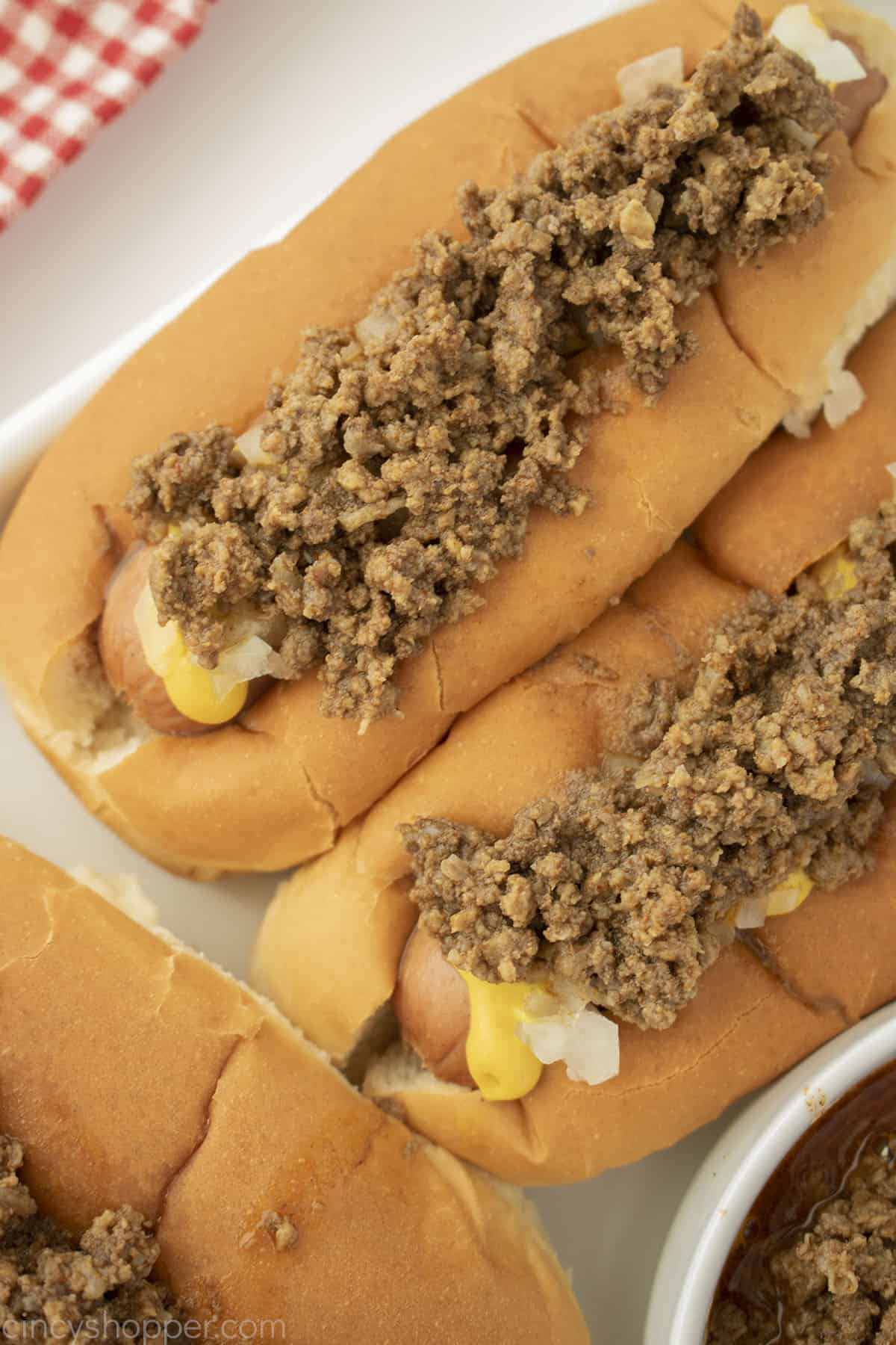 Texas hot meat sauce on top of hot dogs.