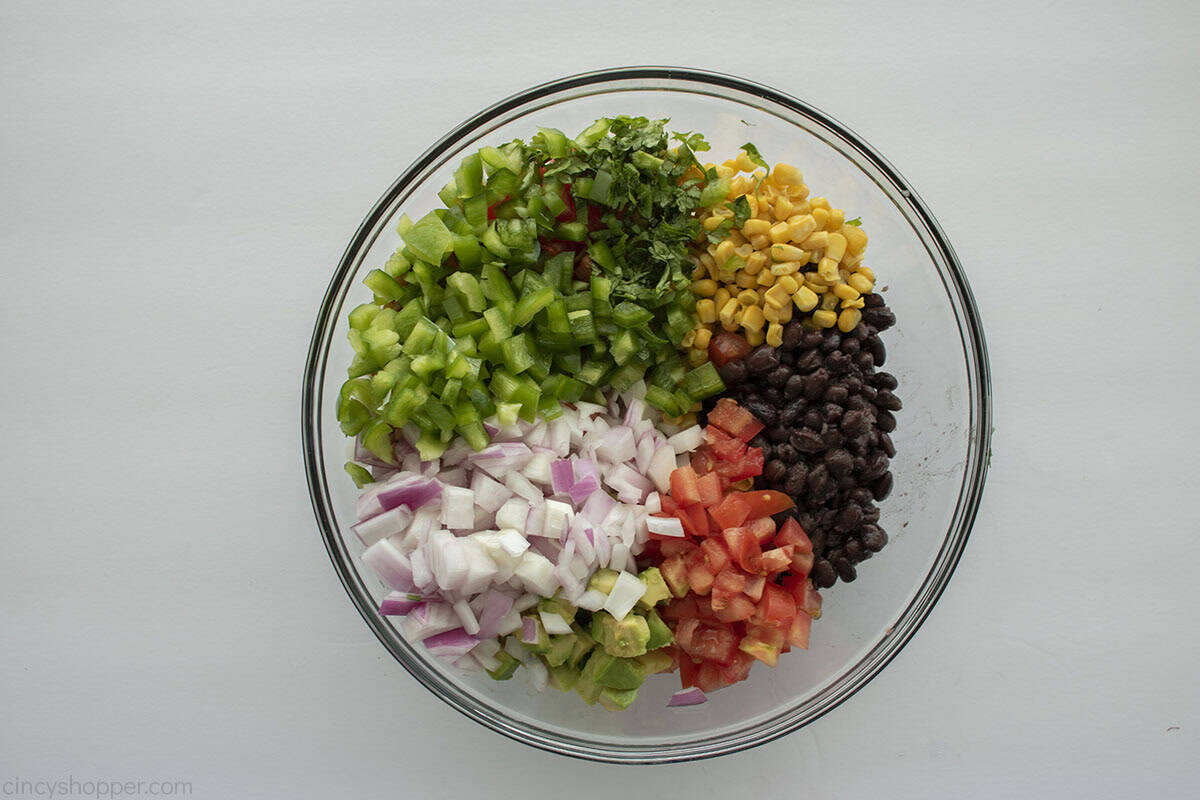Texas Caviar ingredients in a clear bowl.