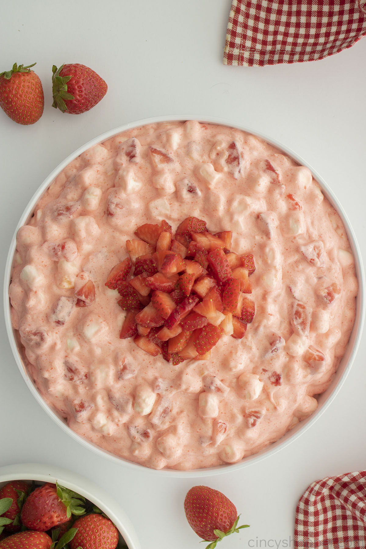 Strawberry Fluff Salad in a white bowl.