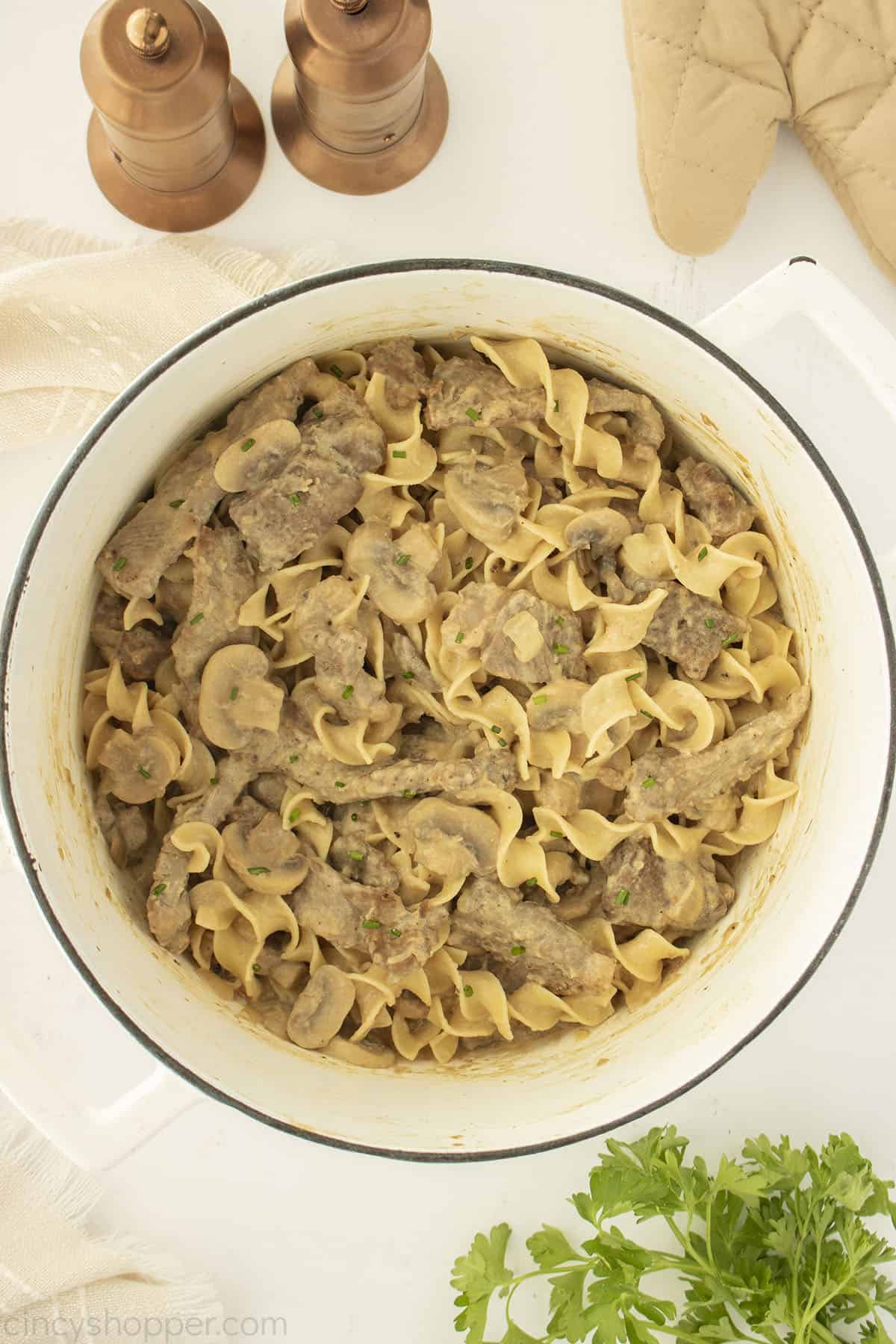 Beef Stroganoff in a white dutch oven.