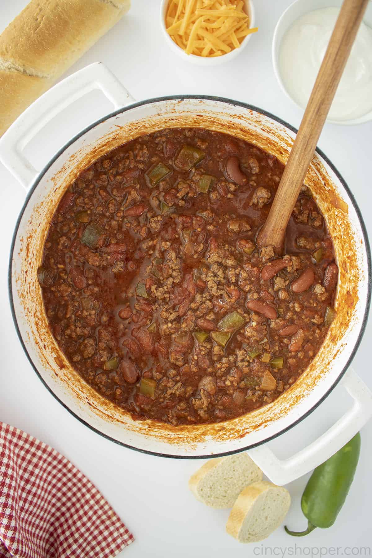 Pot filled with ground beef chili.