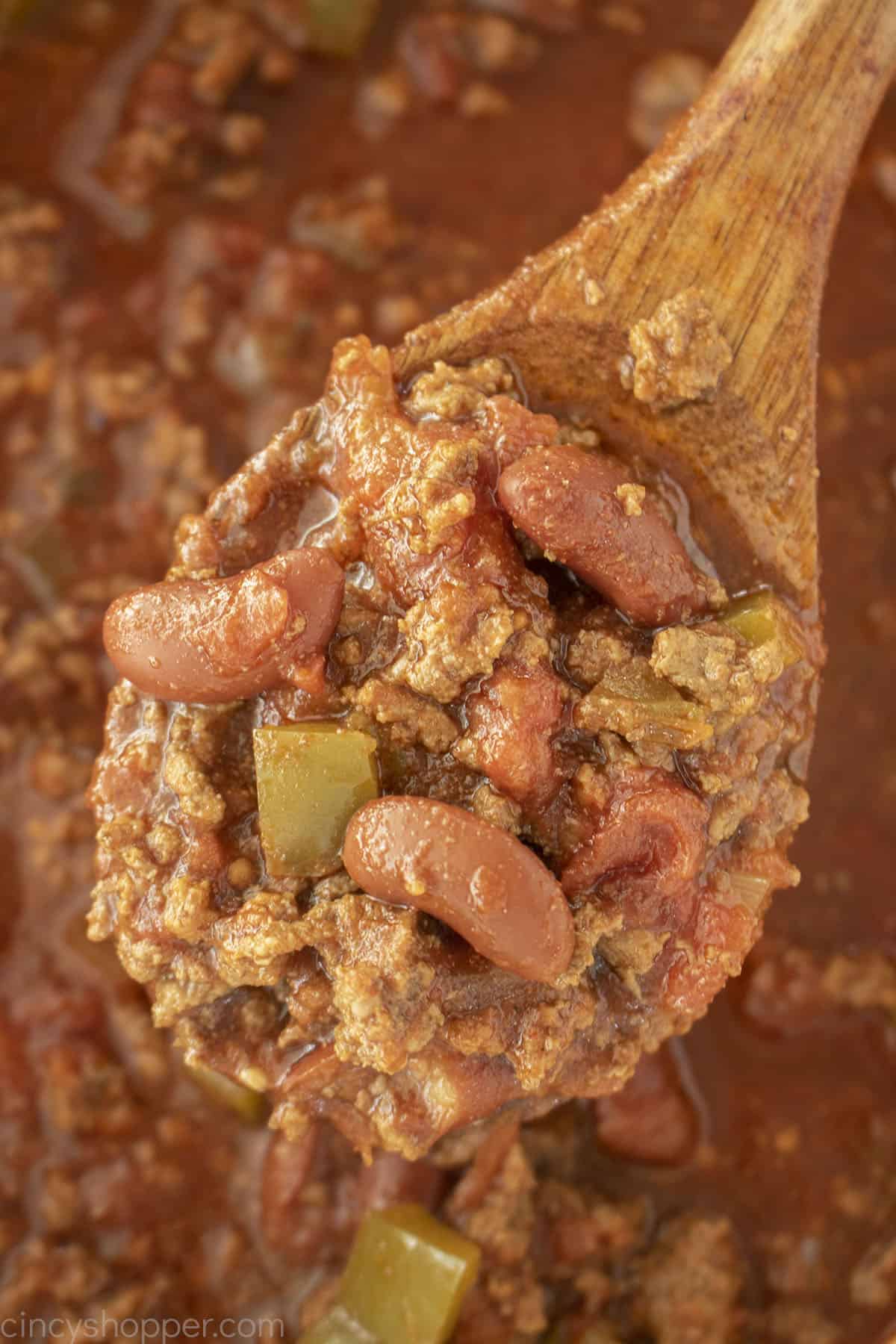 BEST chili on a wooden spoon.