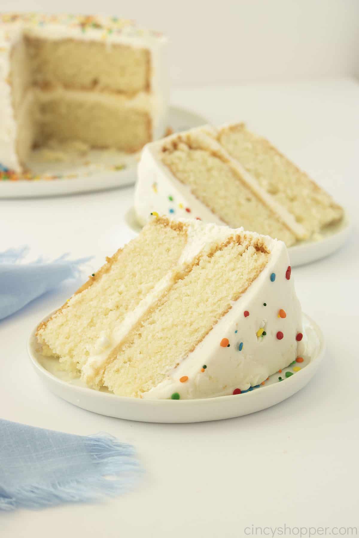 Slice of Best White Cake on a plate.