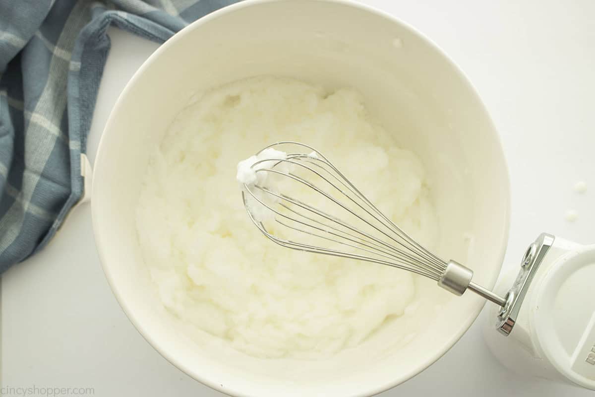 Whipped egg whites in a bowl.